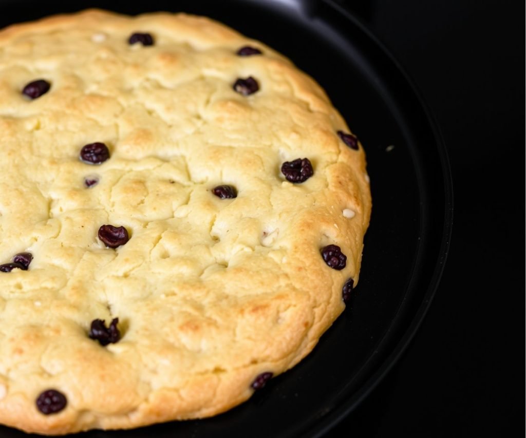 Mary Berry Welsh cakes cooked on a griddle with currants and sugar
