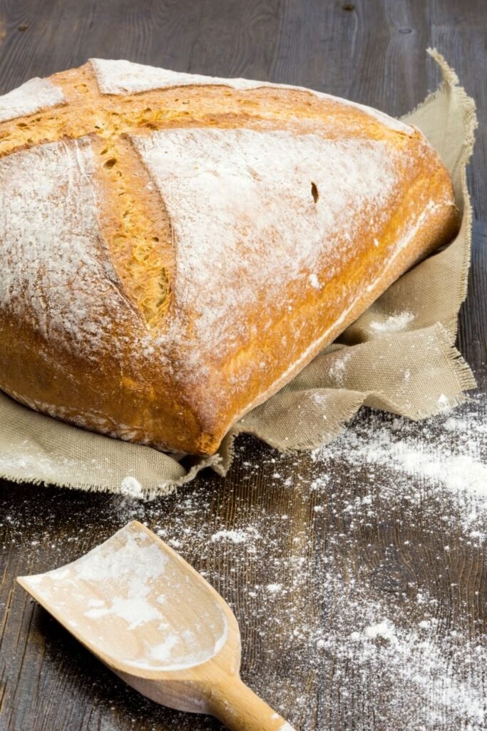 Mary Berry soda bread with a golden crust and traditional cross scored on top