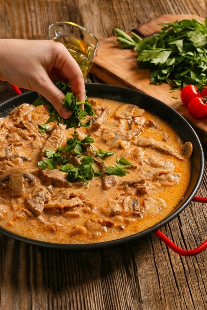 Mary Berry beef stroganoff with flank steak strips in a creamy sour cream sauce