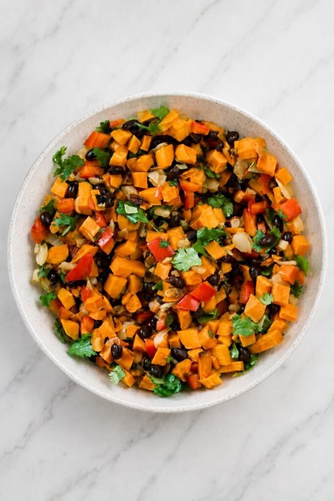 Sweet potato salad with allspice roasted cubes, feta, walnuts and cranberries